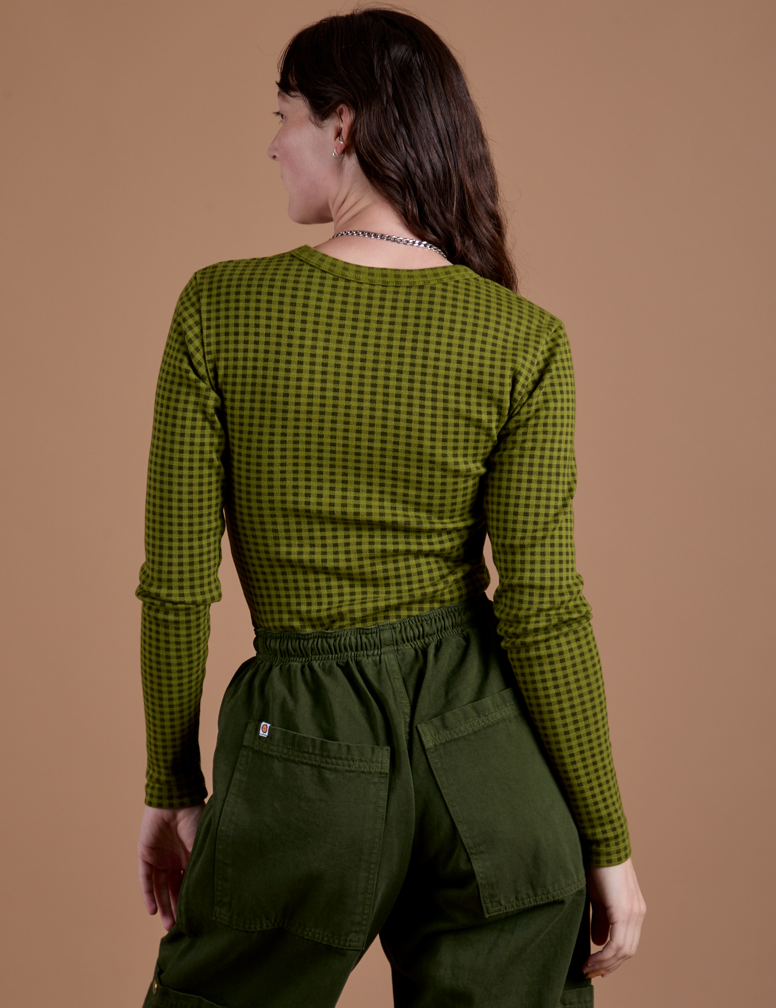 Gingham Long Sleeve Baby Tee in Summer Olive back view on Alex