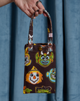 Halloween Masks Cell Phone Tote held by Alex
