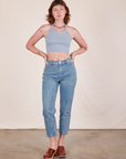 Alex is wearing Halter Top in Periwinkle and light wash Frontier Jeans