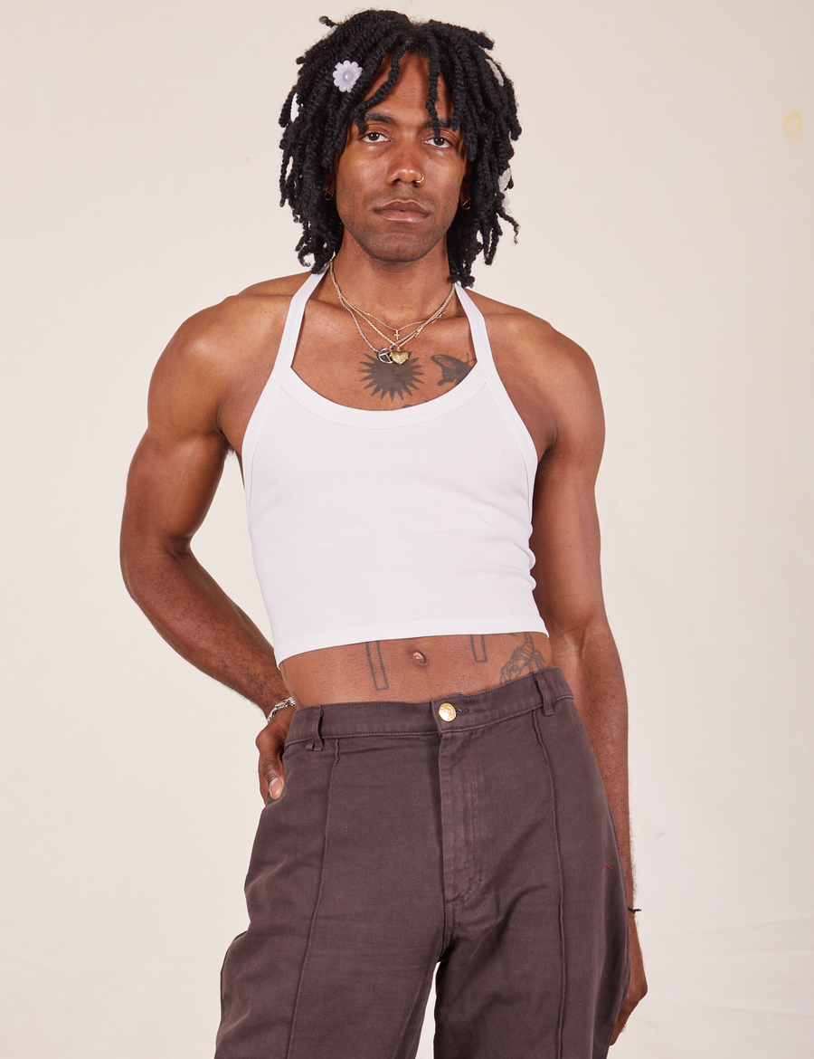 Jerrod is 6'3" and wearing XS Halter Top in Vintage Off-White paired with espresso brown Western Pants