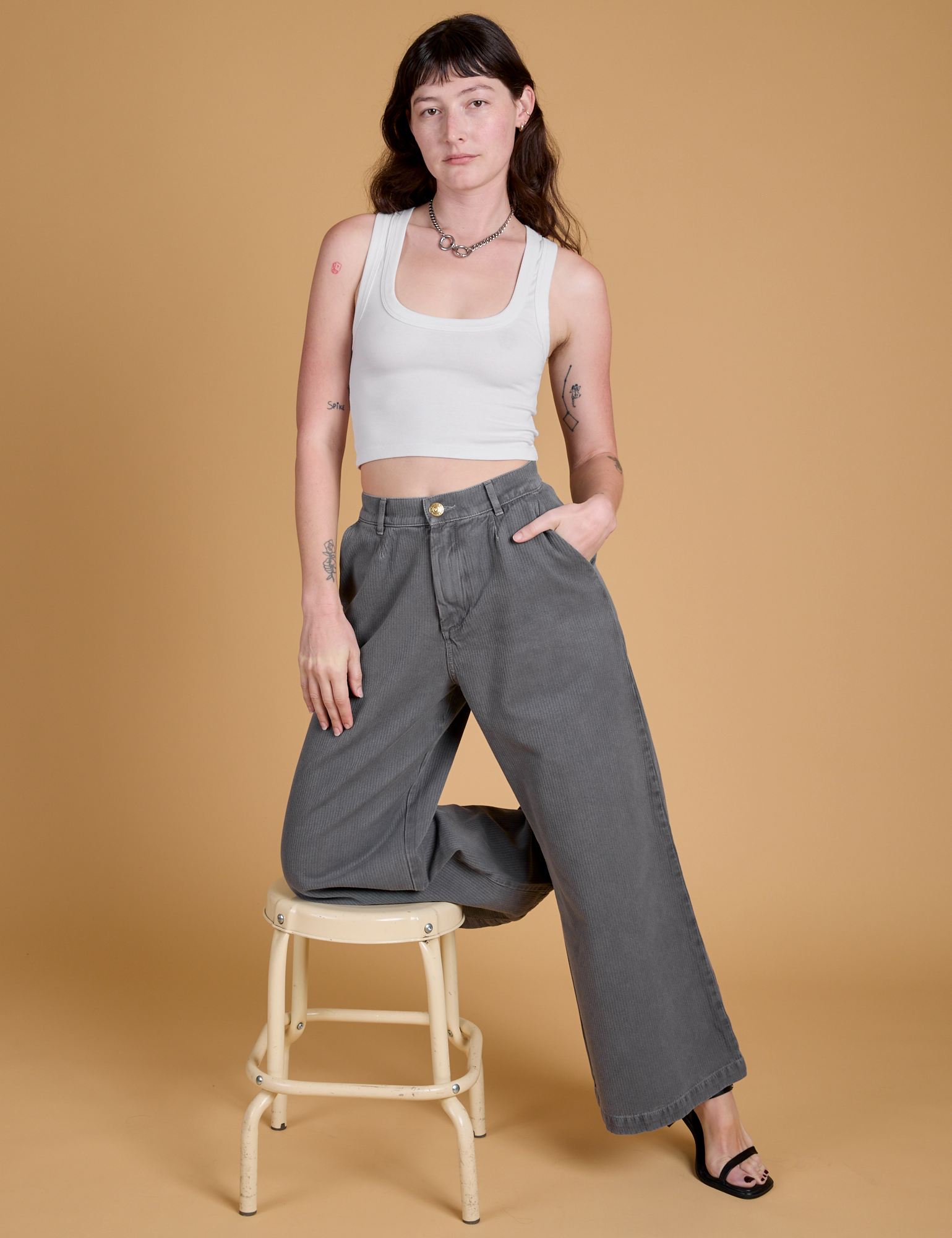 Heritage Wide Leg Trousers in Washed Grey and vintage tee white Cropped Tank worn by Alex