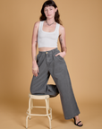 Heritage Wide Leg Trousers in Washed Grey and vintage tee white Cropped Tank worn by Alex
