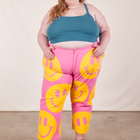 Catie is 5'11" and wearing 5XL Icon Work Pants in Smilies paired with marine blue Cropped Cami