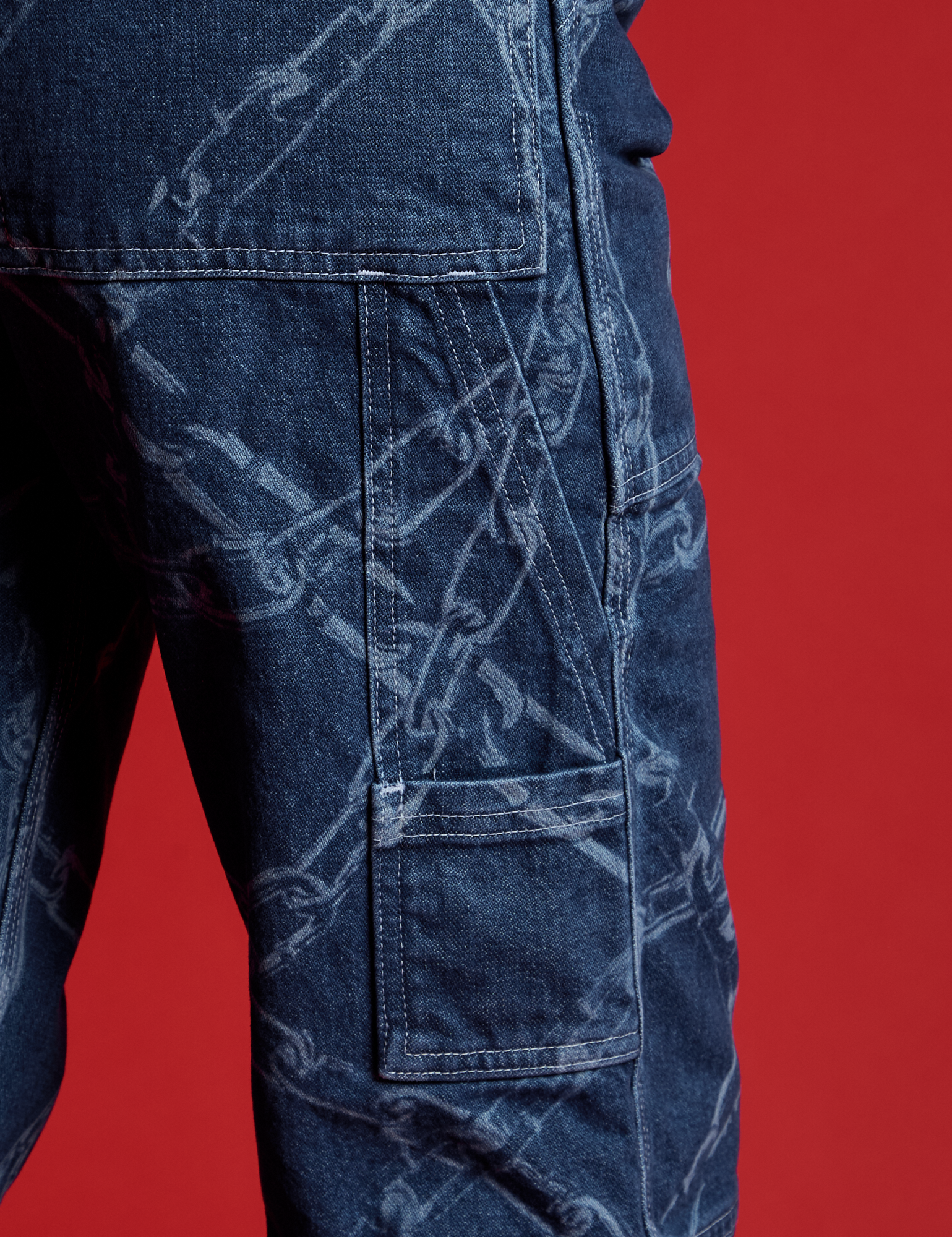 Close up of Carpenter Overalls in Chain Link on Alex