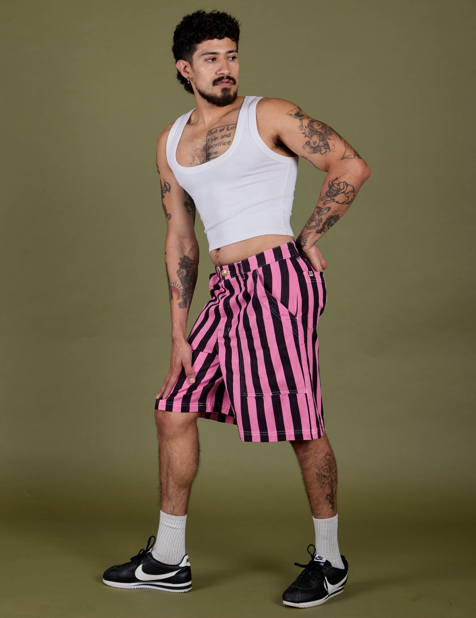 Angled front view of Longline Work Shorts in Bubblegum Pink and vintage tee white Cropped Tank