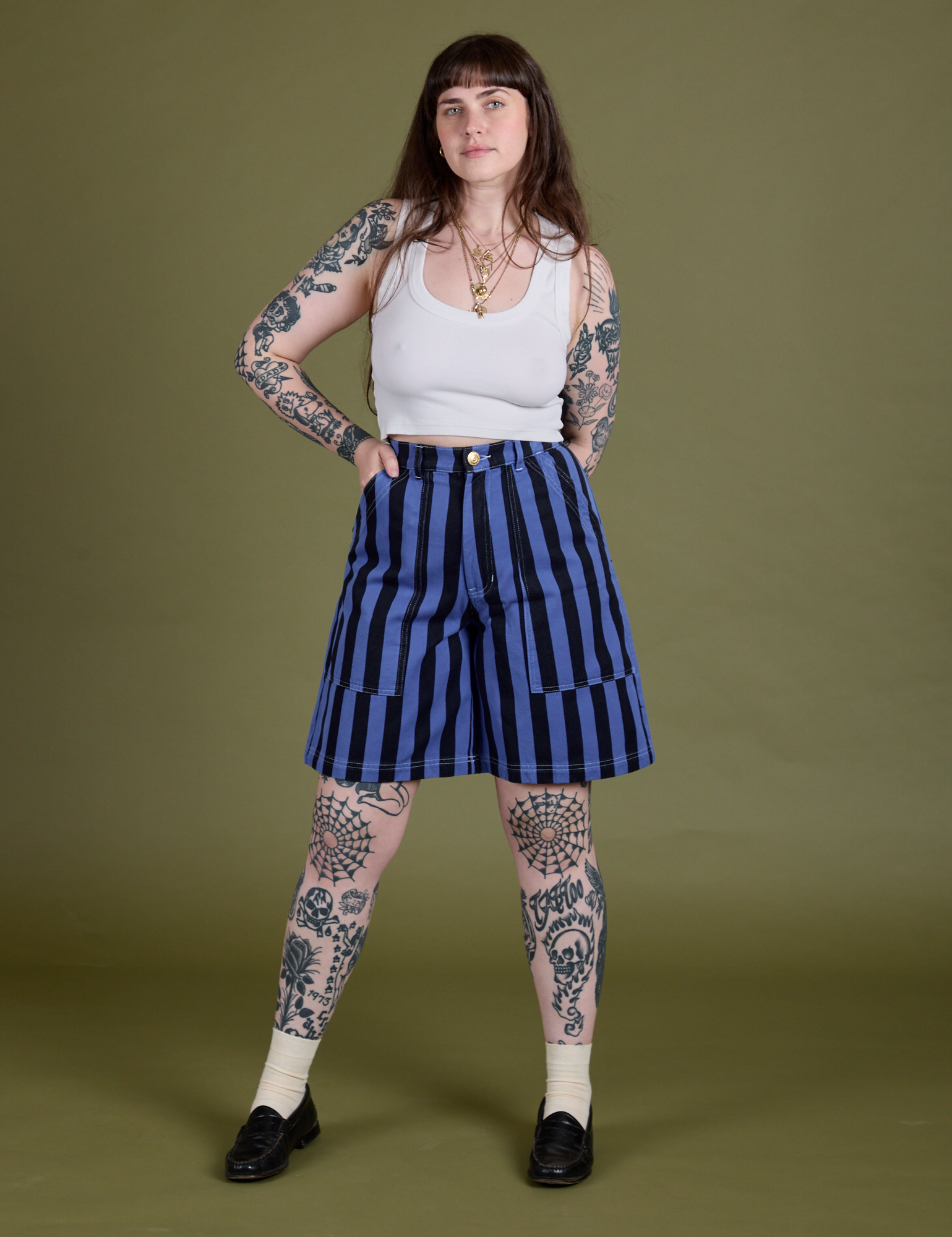 Sydney is 5’9” and wearing S Longline Work Shorts in Cornflower paired with Cropped Tank in Vintage Tee White