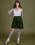 Sydney is 5’9” and wearing S Longline Work Shorts in Evergreen paired with vintage tee white Cropped Tank