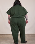 Back view of Long Jumpsuit in Swamp Green on Sam