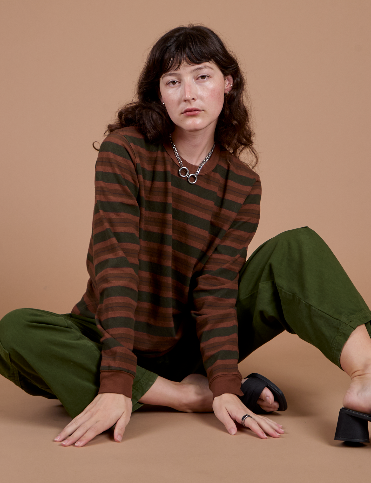 Alex is wearing Long Sleeve Striped Burly Tee in Fudgesicle