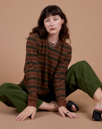 Alex is wearing Long Sleeve Striped Burly Tee in Fudgesicle