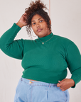 Morgan is 5'5" and wearing XL Essential Turtleneck in Hunter Green