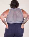 Back view of Mesh Tank Top in Periwinkle and navy Western Pants worn by Sam