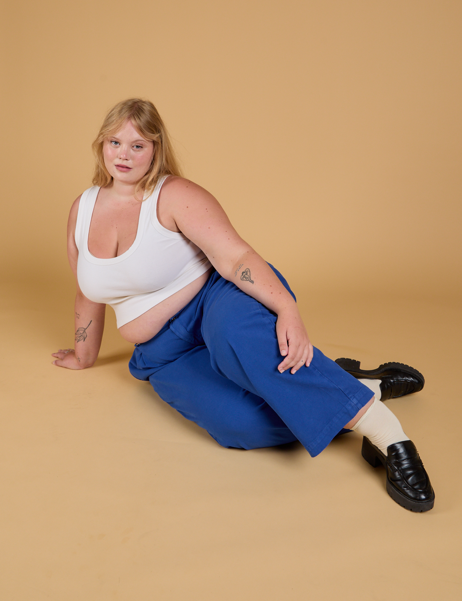 Baggy Mid-Rise Trousers in Royal Blue and vintage tee white Cropped Tank worn by Juliet