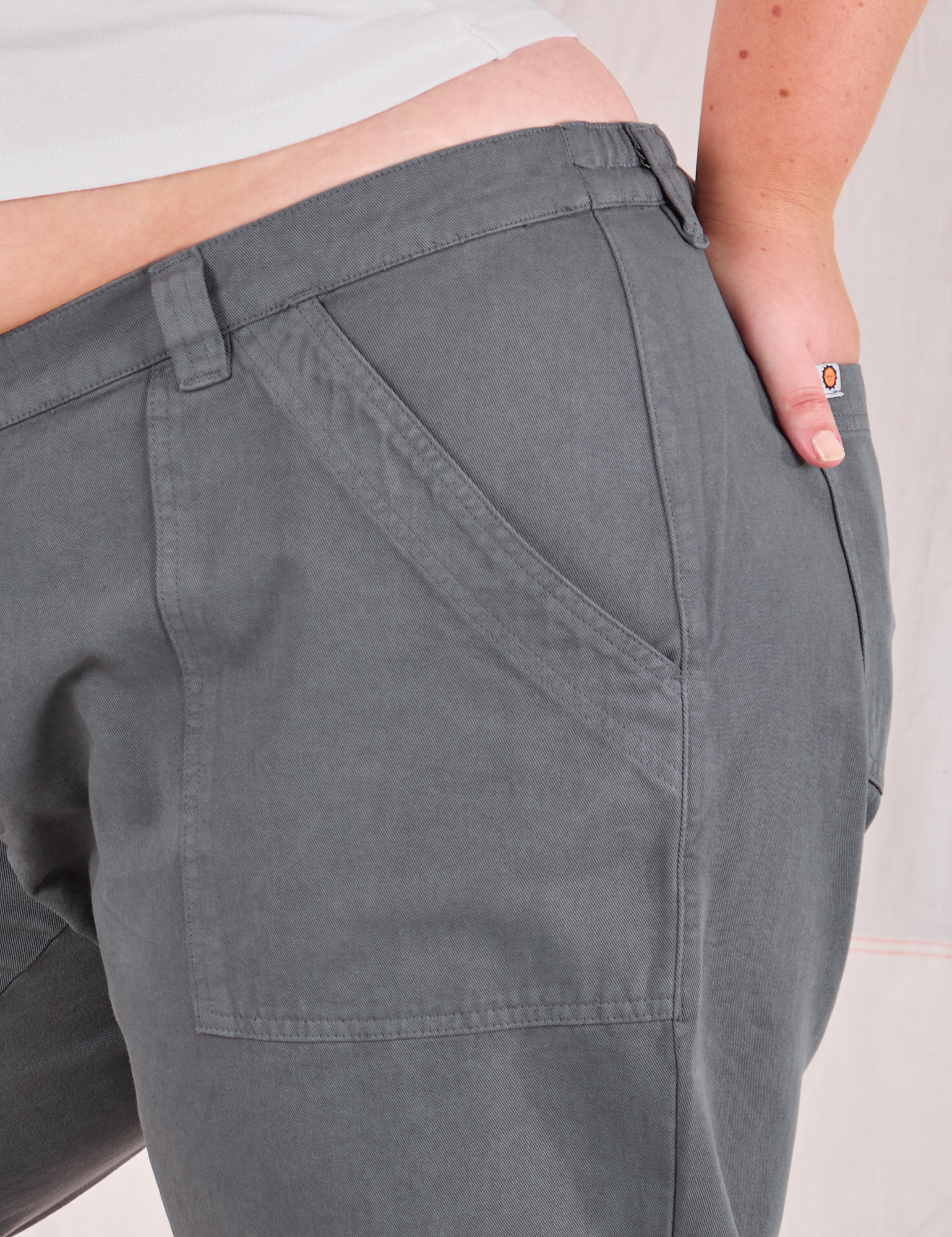 Mid-Rise Work Pants in Slate Grey front pocket close up on Juliet