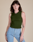 Alex is 5’8” and wearing P Muscle Tee in Evergreen