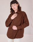 Alex is 5’8” and wearing P Twill Overshirt in Fudgesicle Brown