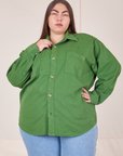 Marielena is wearing a buttoned up Oversize Overshirt in Lawn Green