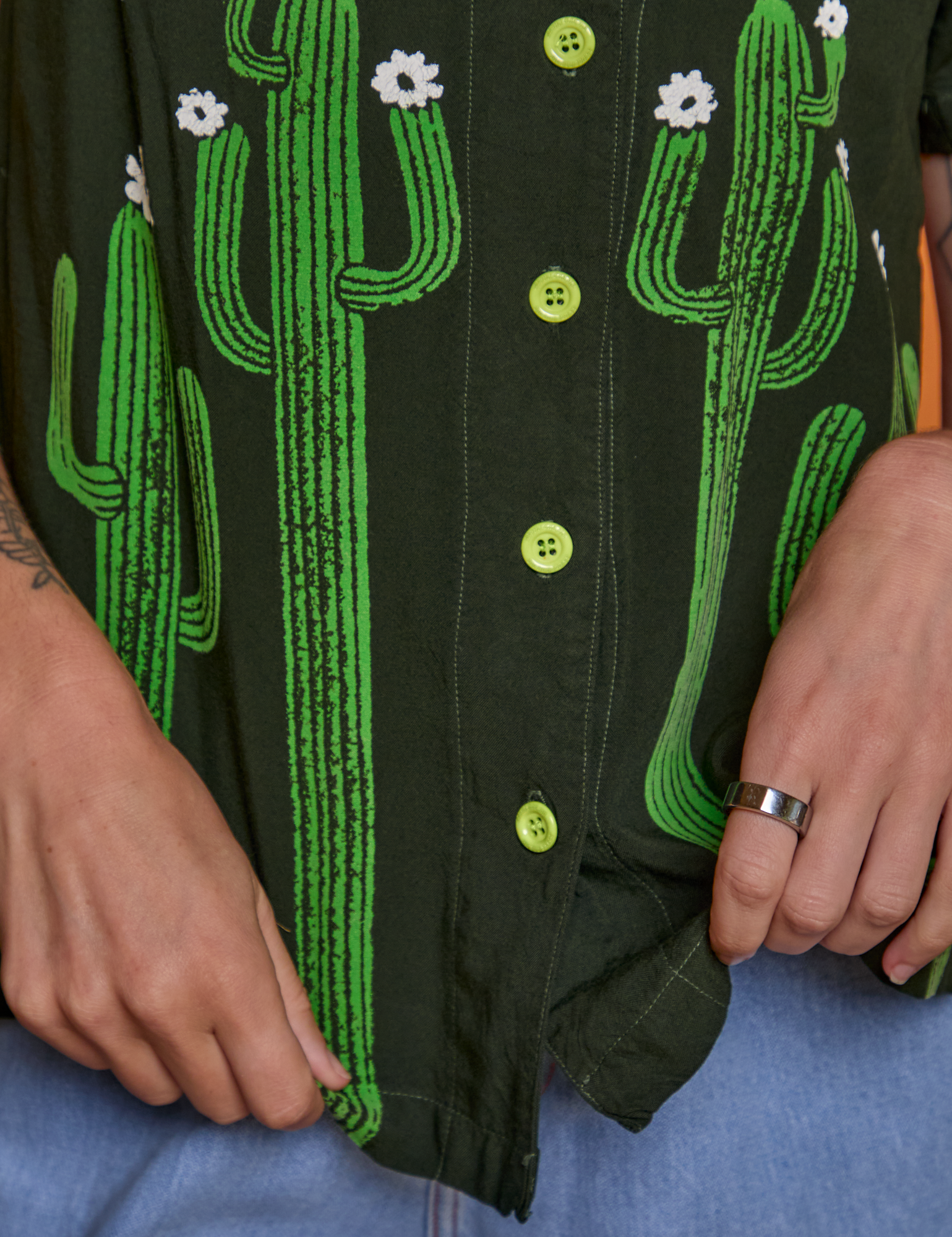 Close up of Paintstamped Pantry Button-Up in Cactus on Alex