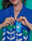 Front close up of buttoned Paintstamped Pantry Button-Up in Daisy on Alex