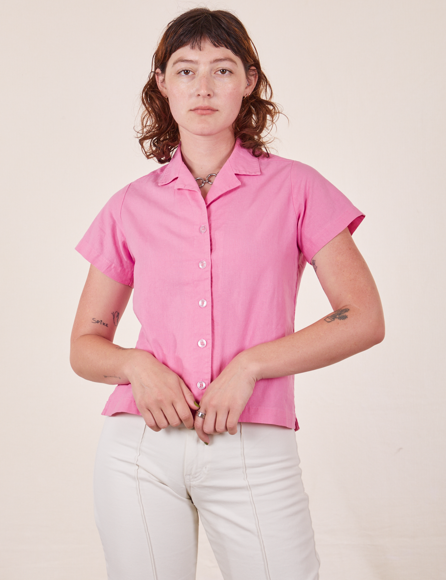 Alex is wearing size P Pantry Button-Up in Bubblegum Pink