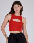 Alex is 5’8” and wearing P Porthole Tank in Mustang Red