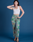 Alex is 5’8” and wearing XXS Work Pants in Quilt Print paired with vintage tee white Cropped Tank