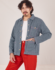Jesse is 5'8" and wearing S Railroad Stripe Denim Work Jacket paired with paprika Western Pants
