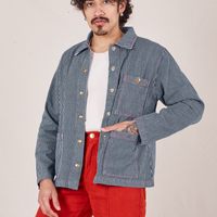 Jesse is 5'8" and wearing S Railroad Stripe Denim Work Jacket paired with paprika Western Pants