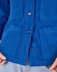 Ripstop Work Jacket in Royal Blue bottom front close up on Alex