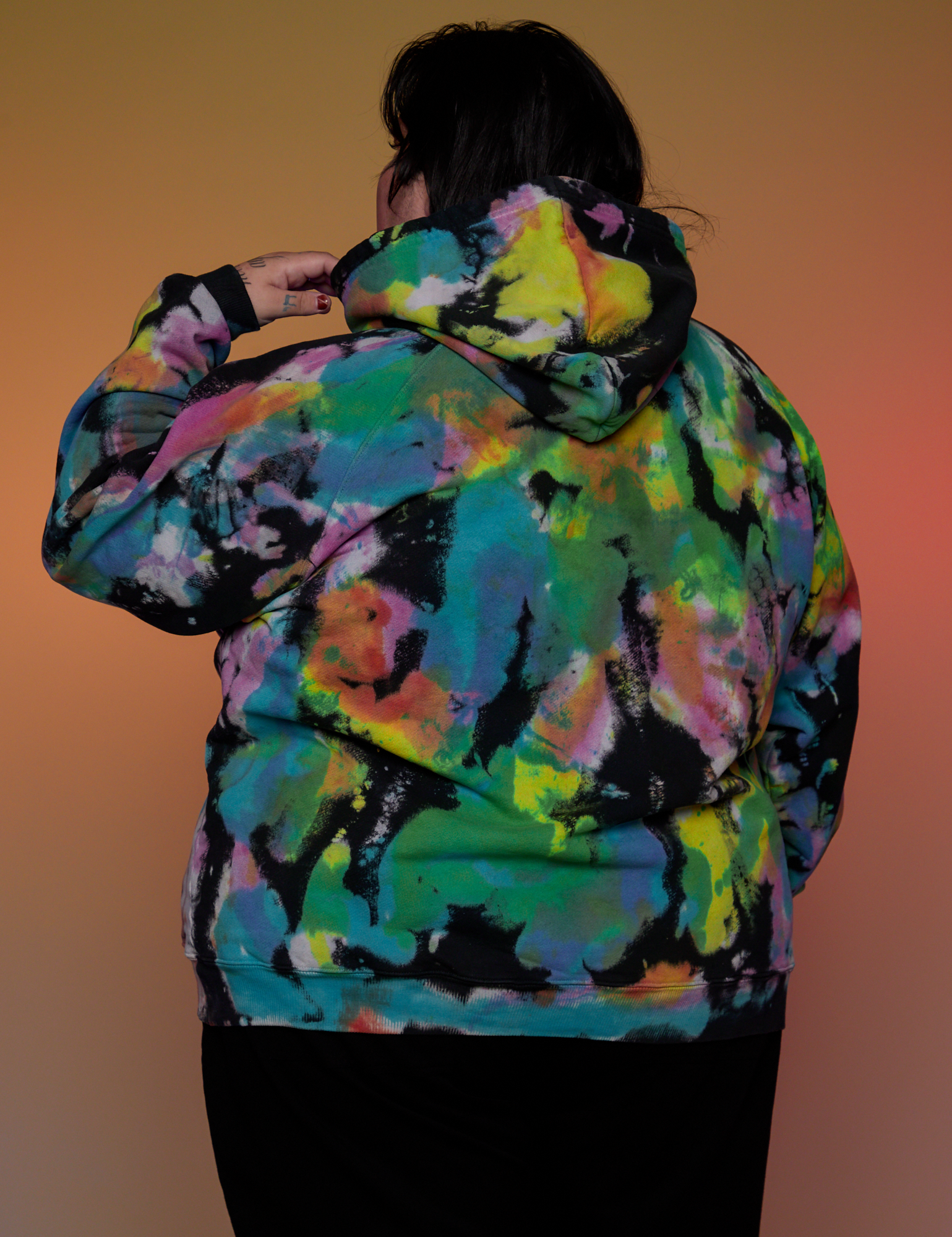 Oversized Hoodie in Rainbow Magic Waters back view on Sam