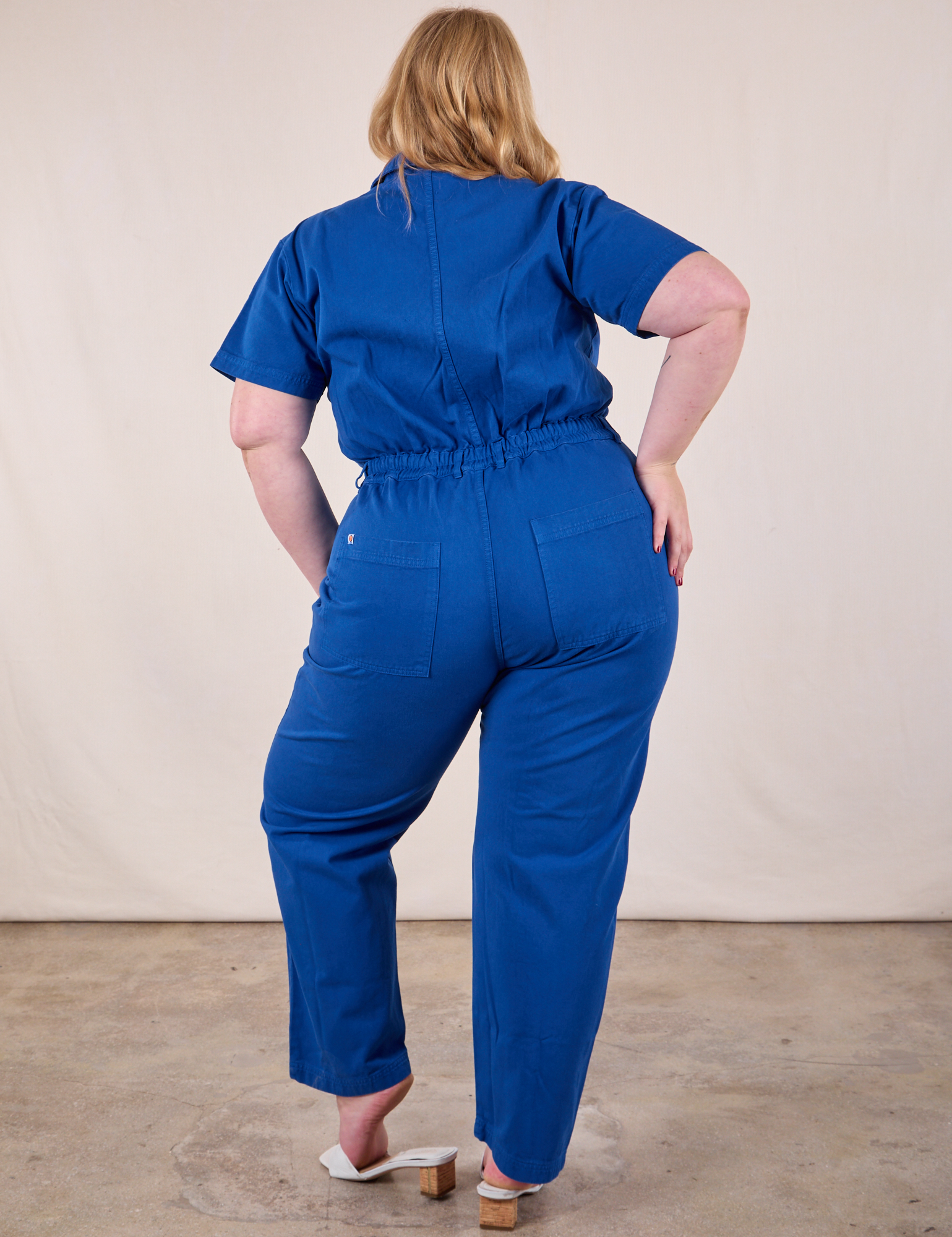 Short Sleeve Jumpsuit in Royal Blue back view on Juliet