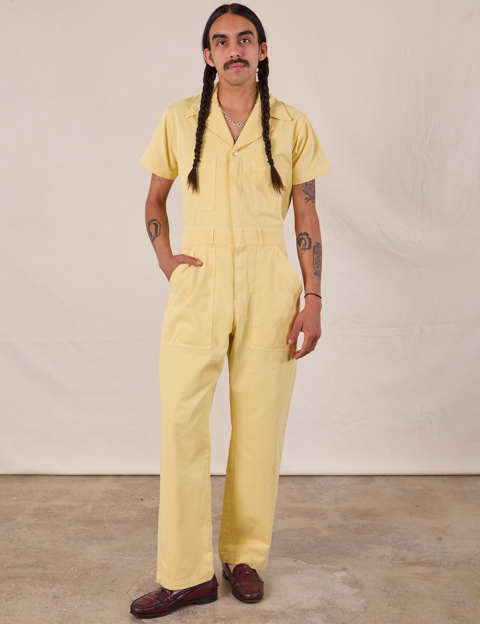 Anthony is 5&#39;10&quot; and wearing S Short Sleeve Jumpsuit in Butter Yellow