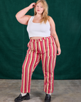 Juliet is 5'7" and wearing 1XL Stripe Work Pants in Cherry Candy paired with Cropped Tank in vintage tee off-white