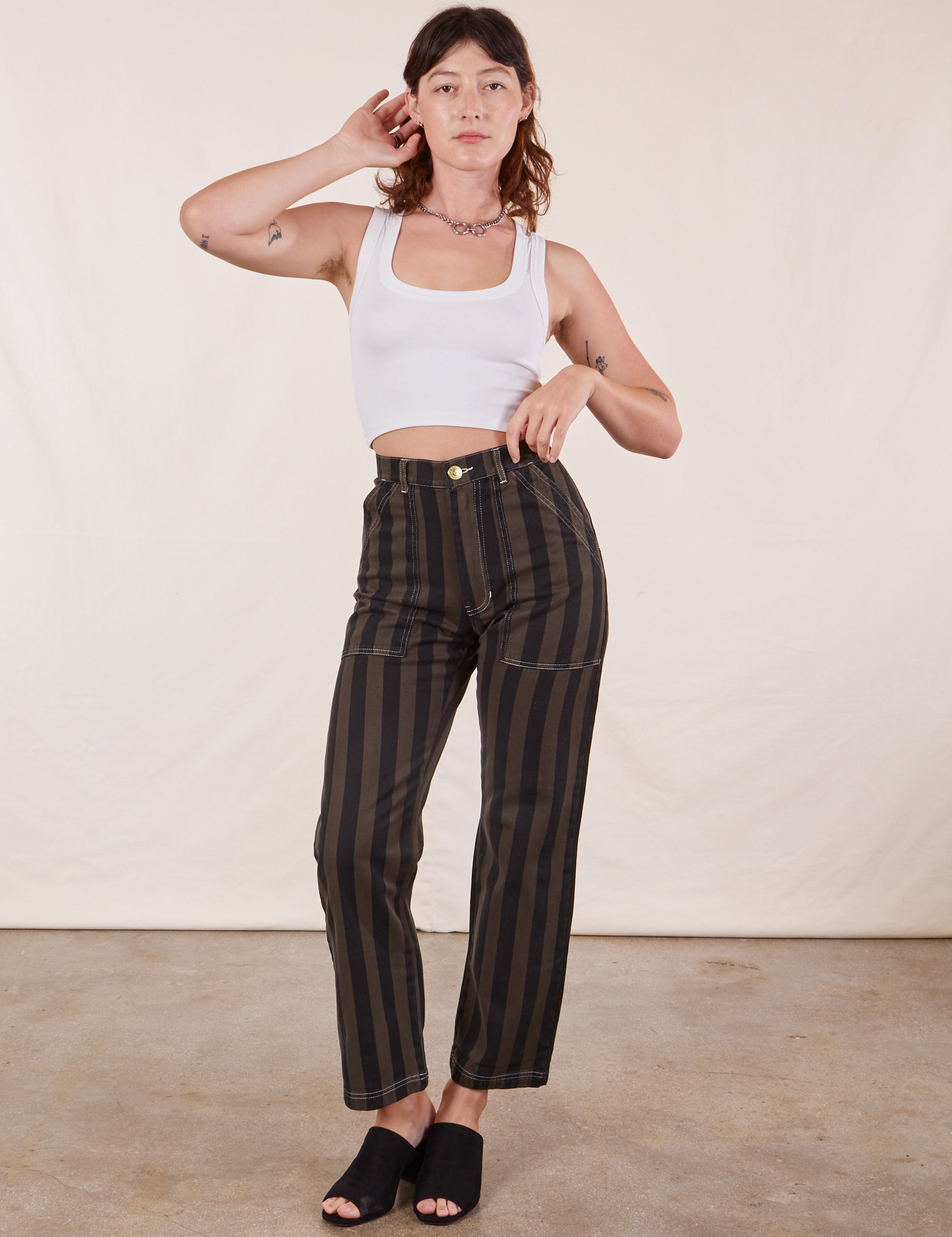 Alex is 5&#39;8&quot; and wearing XS Black Striped Work Pants in Espresso paired with vintage off-white Tank Top