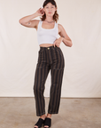 Alex is 5'8" and wearing XS Black Striped Work Pants in Espresso paired with vintage off-white Tank Top