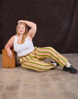 Juliet is wearing Stripe Work Pants in Vintage Sofa and Cropped Tank in vintage tee off-white