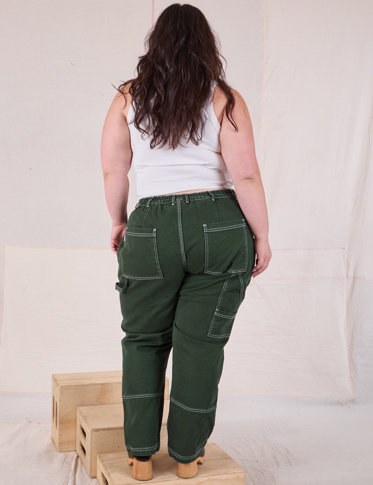 Carpenter Jeans in Swamp Green back view on Ashley