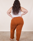 Back view of Cropped Rolled Cuff Sweatpants in Burnt Terracotta on Ashley