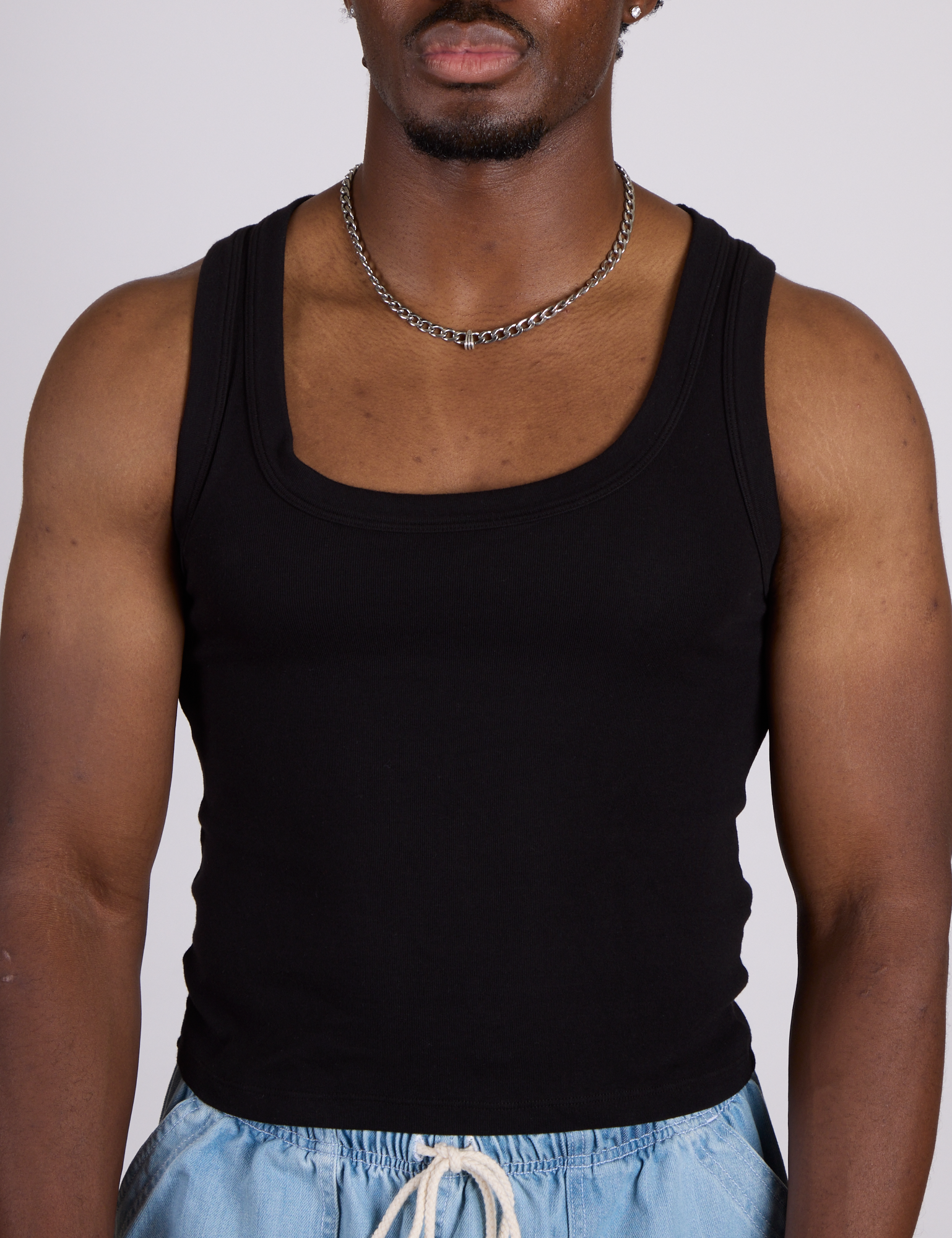 Close up of The Tank Top in Basic Black on Isaac