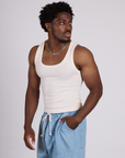 Angled front view of The Tank Top in Vintage Tee Off-White on Isaac