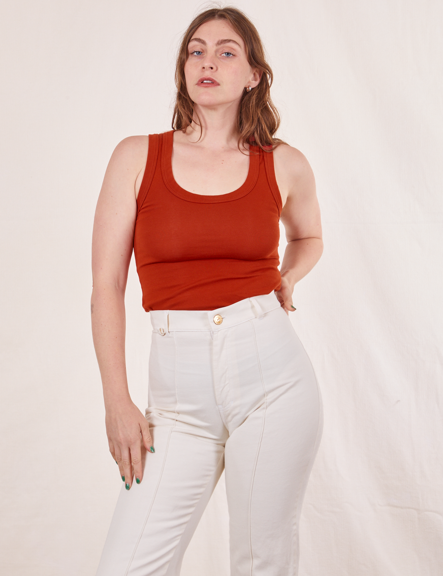 Allison is wearing size XXS Tank Top in Paprika paired with vintage off-white Western Pants