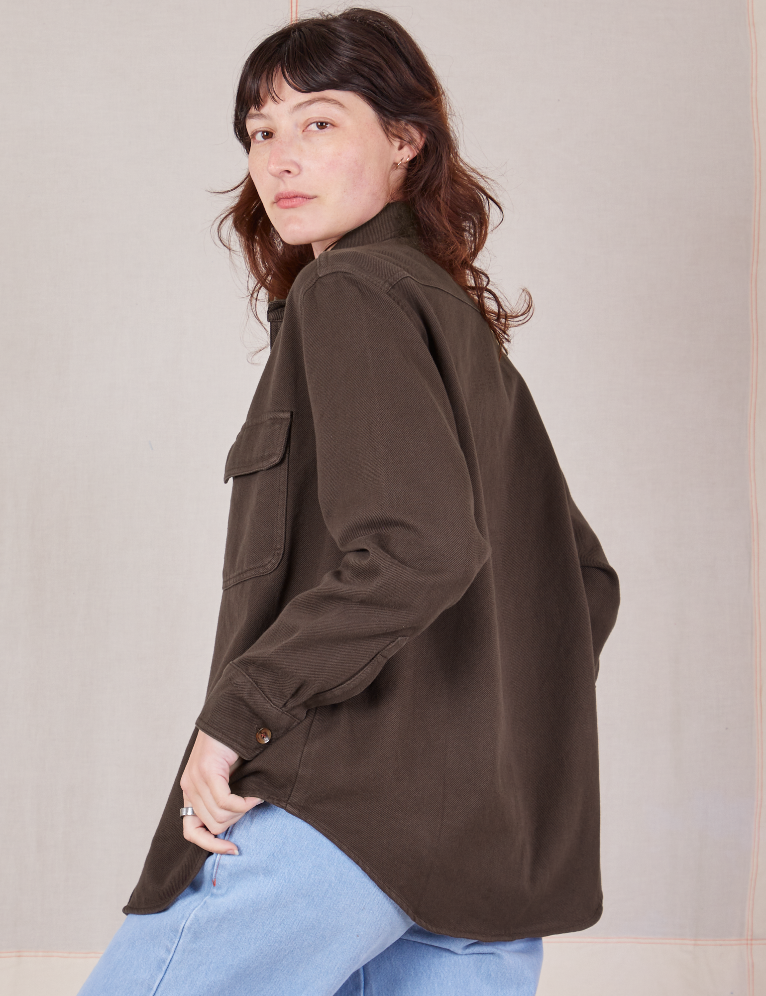 Angled back view of Flannel Overshirt in Espresso Brown on Alex