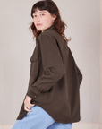 Angled back view of Flannel Overshirt in Espresso Brown on Alex