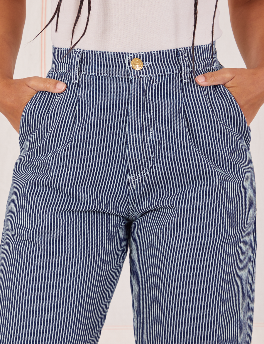 Front close up of Denim Trouser Jeans in Railroad Stripe. Gabi has both hands in the pockets. 