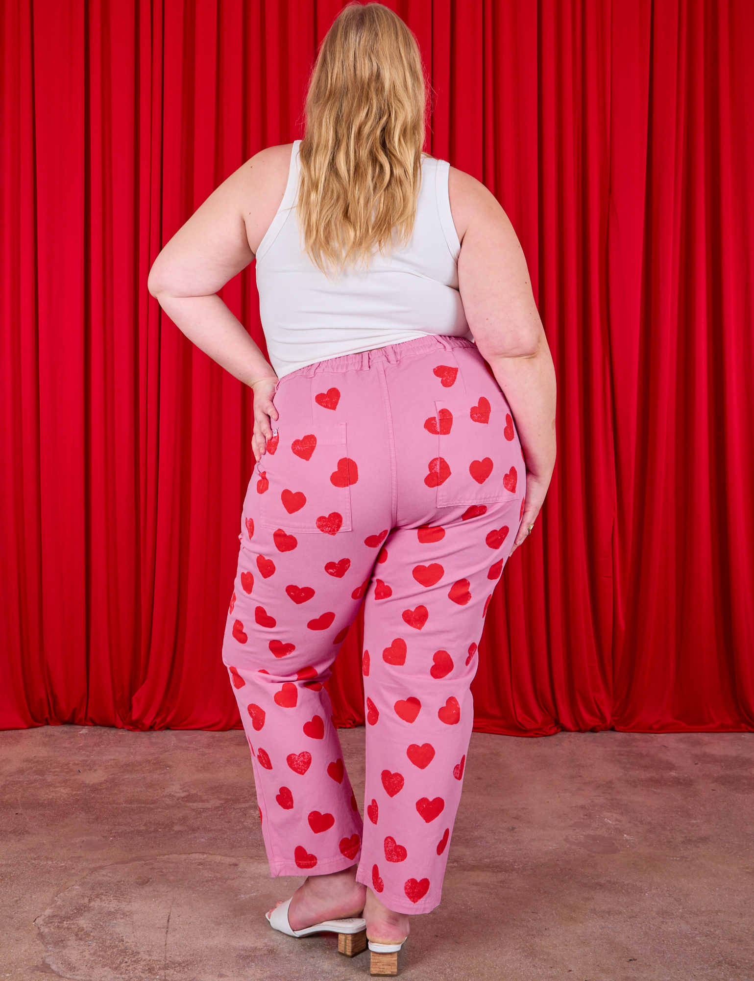 Paintstamped Heart Work Pants in Bubblegum Pink back view on Juliet