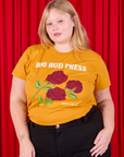 Juliet is 5'7" and wearing L 3 Roses Organic Tee