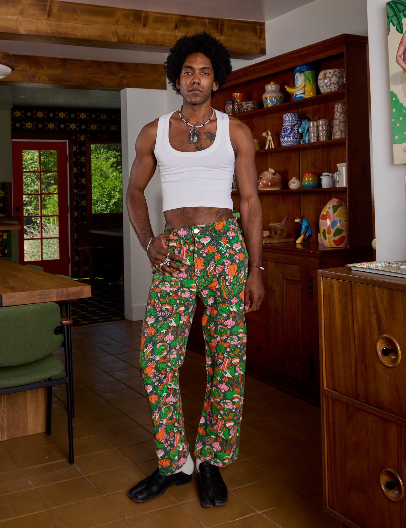 Jerrod is 6&#39;3&quot; and wearing S Work Pants in Kitchen Collection paired with a Cropped Tank in Vintage Tee White