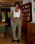 Jerrod is 6'3" and wearing S Work Pants in Kitchen Collection paired with a Cropped Tank in Vintage Tee White
