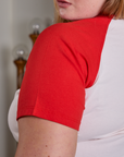 Short Sleeve Raglan Tee in Tomatoes sleeve close up on Juliet