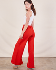 Wide Leg Sweat Pants in Mustang Red angled back view on Alex